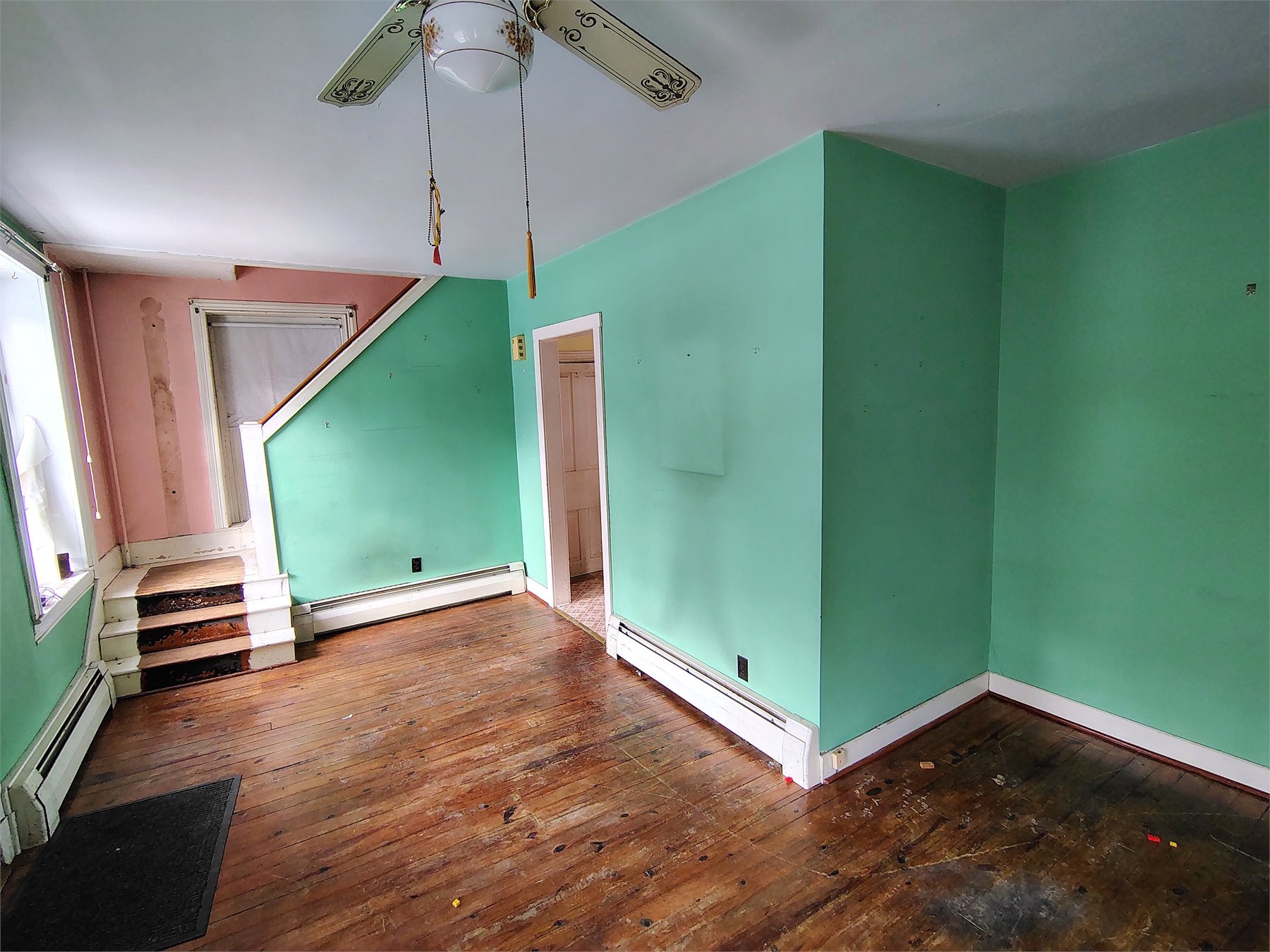 Living room before renovation, left view